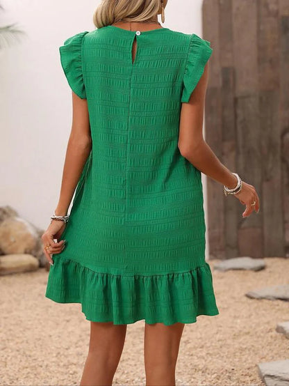 Dress with slits and ruffles